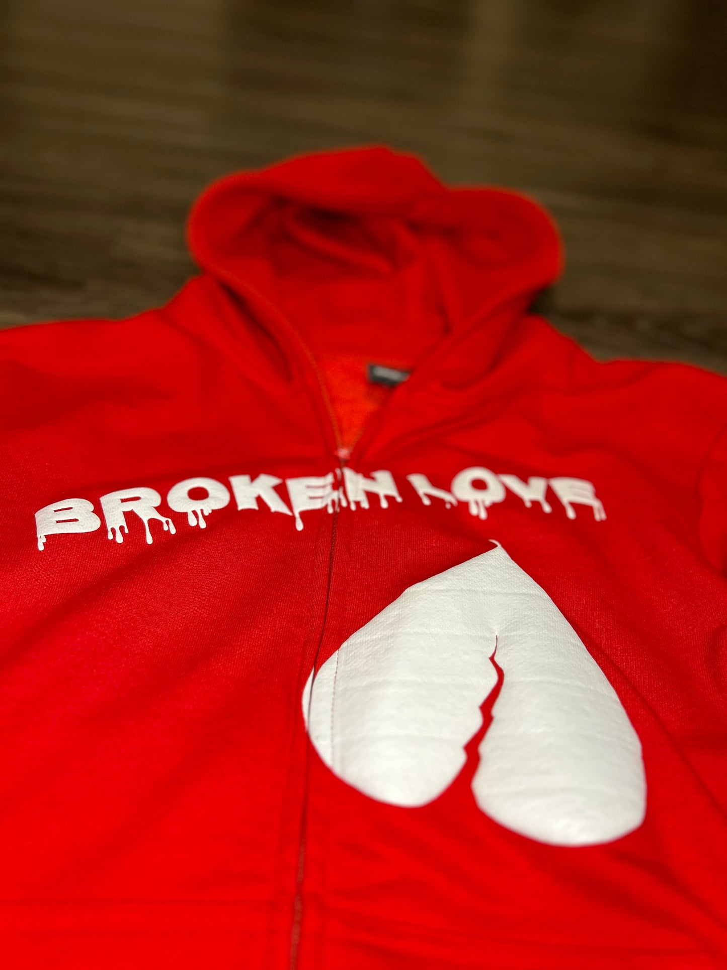 Red zip-up Broken Love Jacket